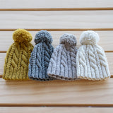 Colour range of cable knit hat