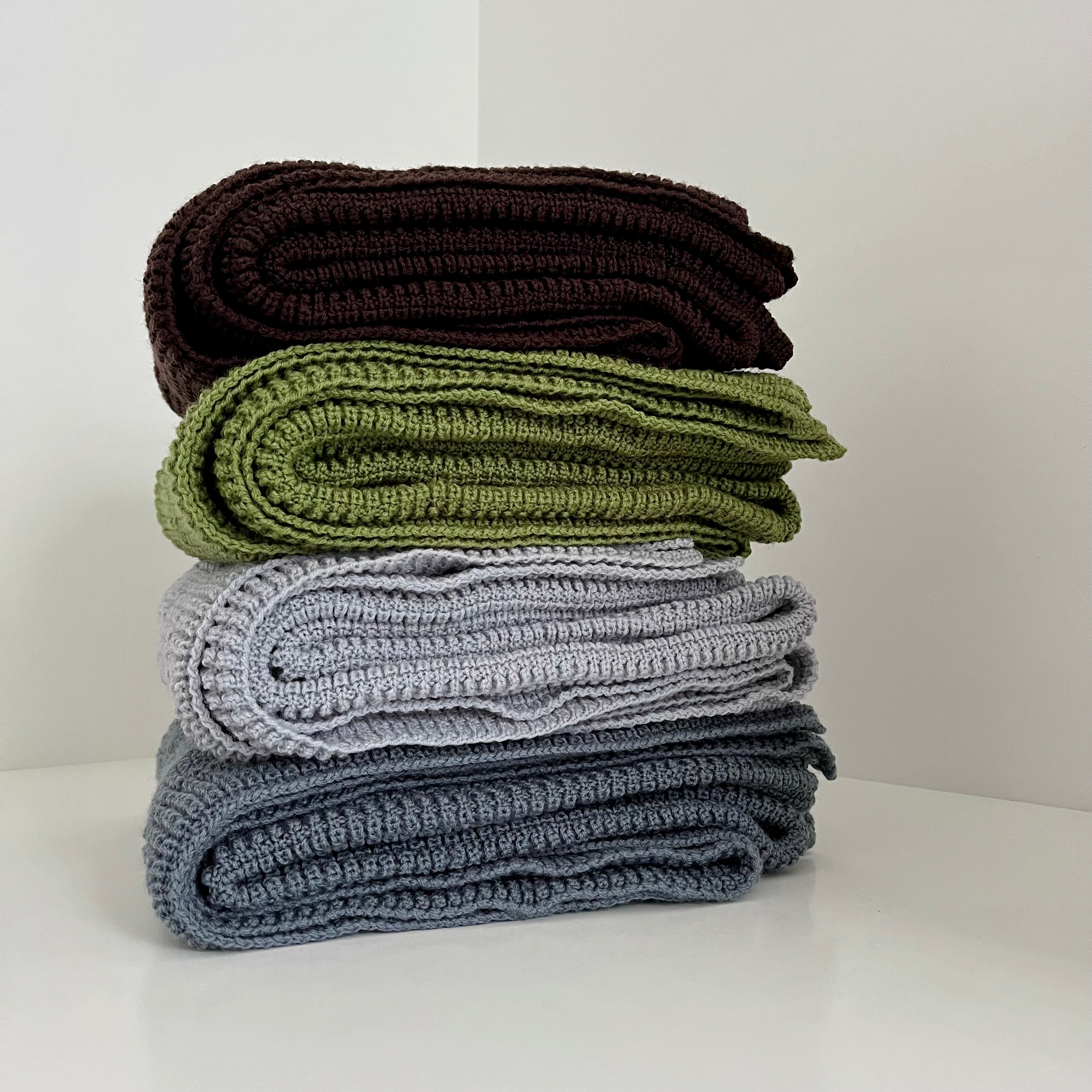 Folded merino cot blankets nz made in 4 colours