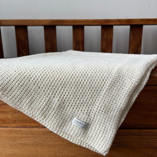 Merino Buggy Blanket on chair