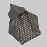 Mushroom and blue striped baby hoodie on a white surface