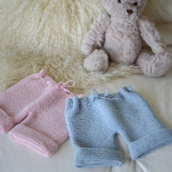 Pink and blue chunky knit pants