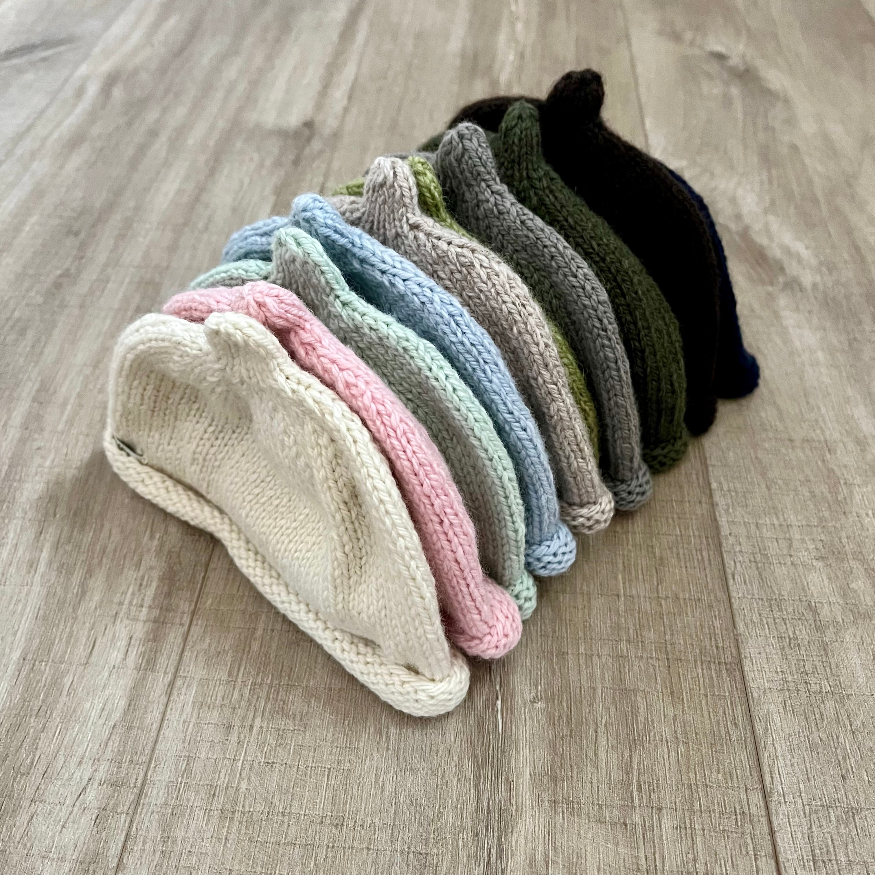 Beanie colour range on wooden surface
