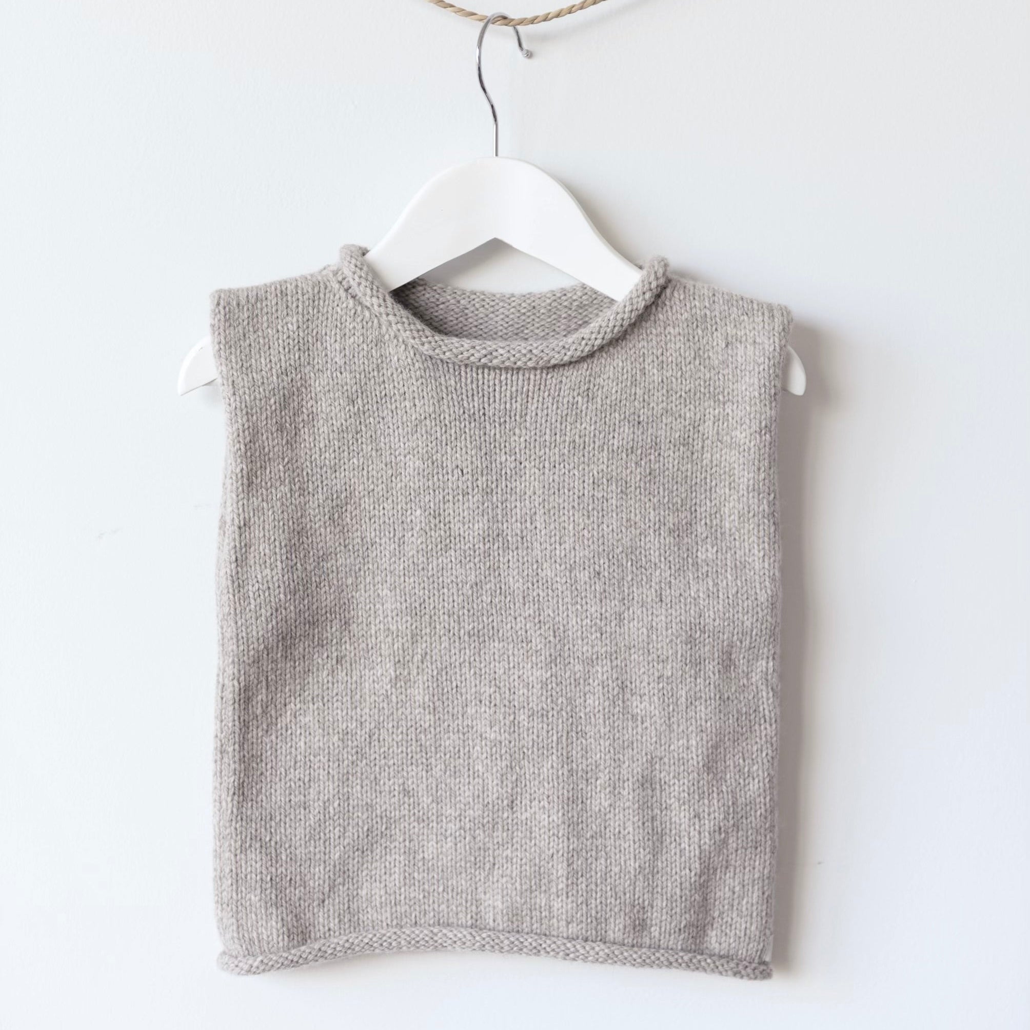 Roll neck vest oatmeal marle on hanger