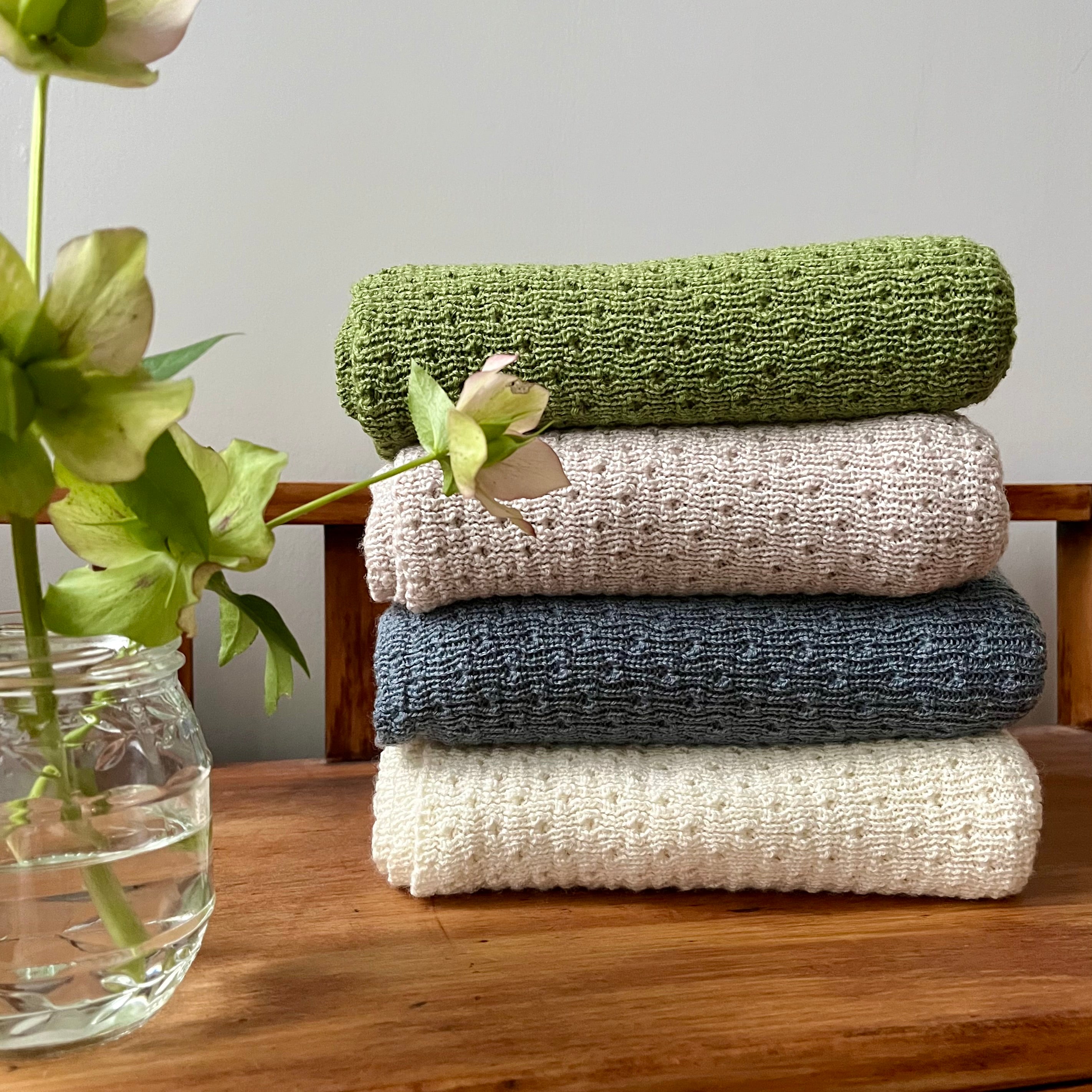 Stack of merino baby wraps