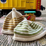 Striped baby beanie in pistachio and mustard colour