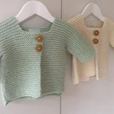 A mint and natural chunky knit jacket