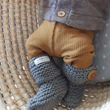 Baby in chunky knit boots