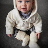 Baby in natural chunky knit boots