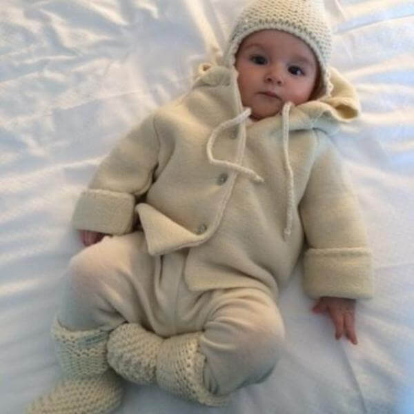 Baby in natural chunky knit hat and boots set