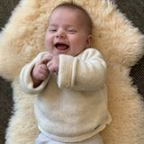 Baby in natural slouchy sweater