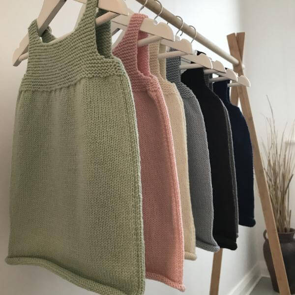 Baby singlet dresses on hangers