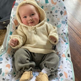 baby wearing mushroom knitted pants