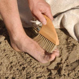 Beach brush being used