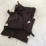 Brown baby comforter, vest and beanie set