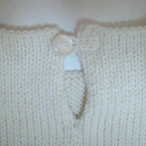 button detail of baby Slouchy sweater