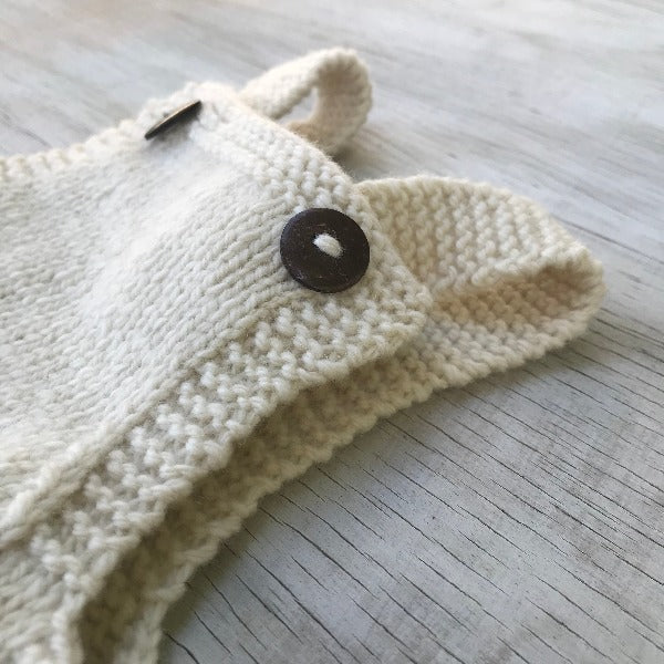 Button detail on baby Overalls