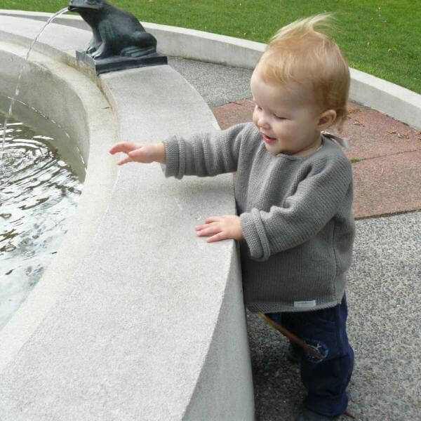Child in mushroom baby slouchy sweater