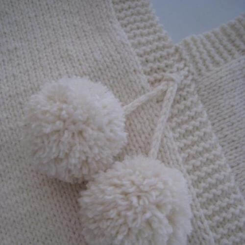 Childrens poncho with pompom