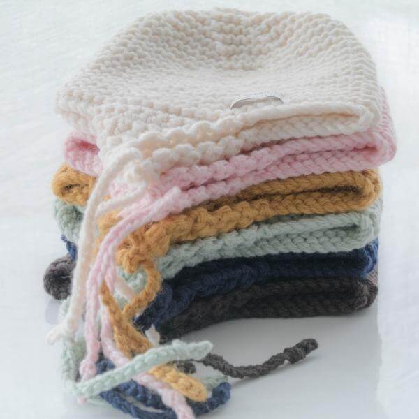 Colour range of chunky knit baby hat