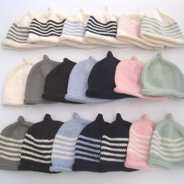 Colour range of knitted baby beanies