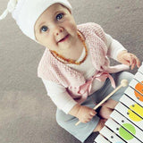 Girl in pink baby girl waistcoat