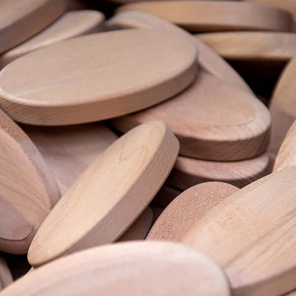 The wooden base of the pet brush being made