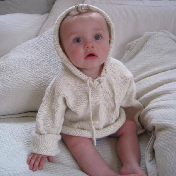 Infant in natural baby hoodie