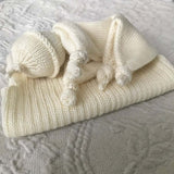 Ivory baby comforter and vest