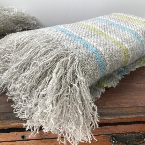 Long Fringe Carnival Nursery Throw 