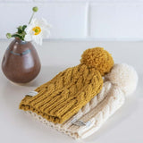 mustard and natural cable knit baby hat