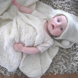 Natural baby pompom hat and travel rug