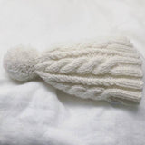 Natural cable knit baby hat