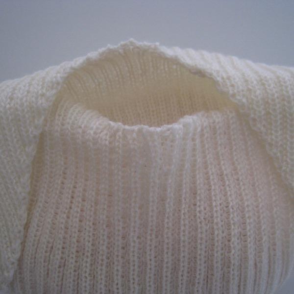 Neck detail of premature baby vest