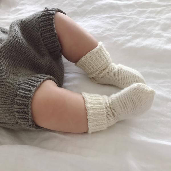 Newborn in merino baby socks