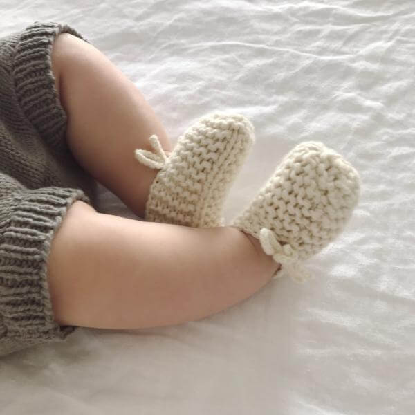 Newborn in natural chunky knit booties
