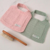 Pink knitted baby bibs