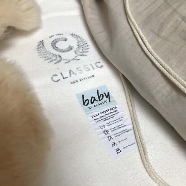 Reverse of play sheepskin baby rug