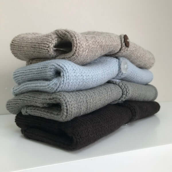 Stack of baby cardigan