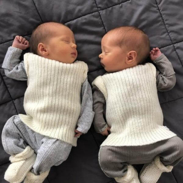 Twins wearing a premature vest