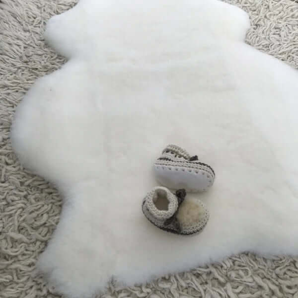 White sleep sheepskin baby rug